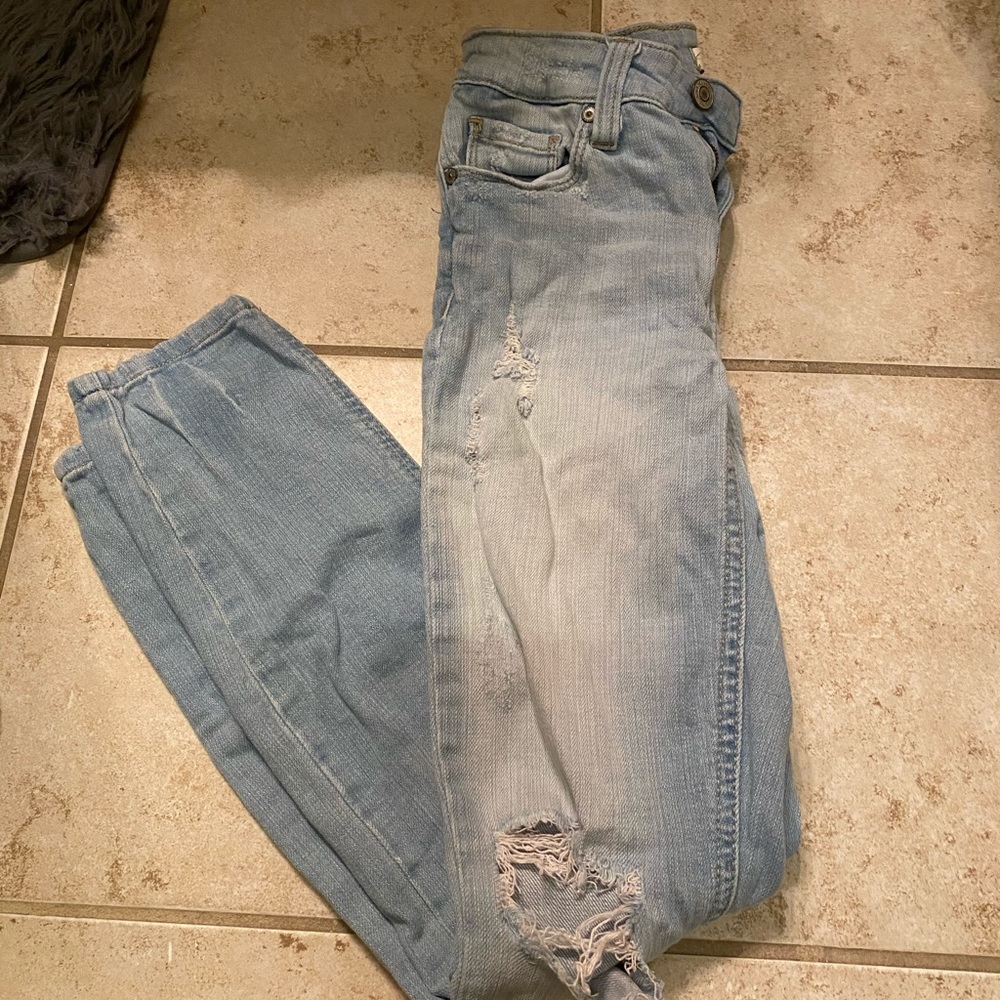 Low rise skinny distressed jeans